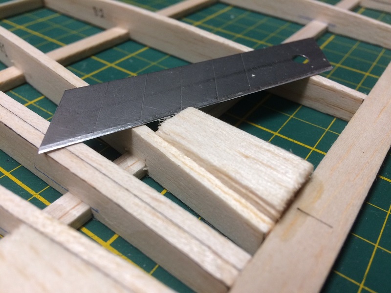 045 cutting hinge blocks to shape after glueing in place.jpg